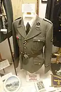 Nazi era artifacts in the Lofoten Krigsminnemuseum, Norway: A genuine SS uniform used in German occupied Norway during World War II and a (probably) fake "Swingtanzen verboten" sign.