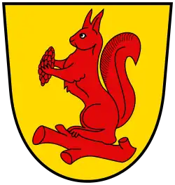 Un écureuil rouge sur fond jaune