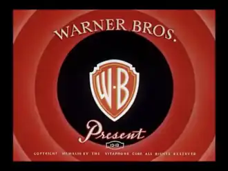 Logo de la Warner Bros sur fond rouge.