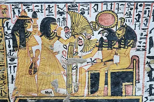 Le fils de Nebenmaat, Wepwautmosi, et sa femme offrent un bouquet de fleurs à Rê et Sekhmet dans l'au-delà.