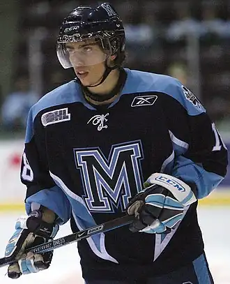 Photographie couleur d'un joueur de hockey sur glace