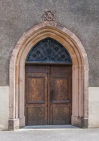 Église Saint Jean-Baptiste de Noailhac, Aveyron, porte en bois