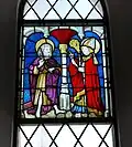 Vitrail du XVe&nbsp;siècle dans le chœur : à gauche, Jean le Baptiste.