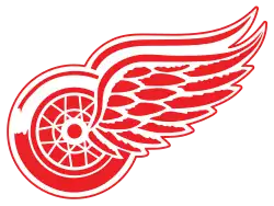 Logo des Red Wings représentant une roue ailée rouge.